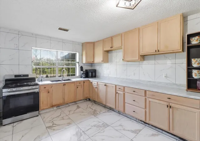 Photo 2 of Single family home for sale at 1736 Nw 26th Place, Ocala, FL 34475 | MLS# OM727709 | Listing updated on 2026-08-15