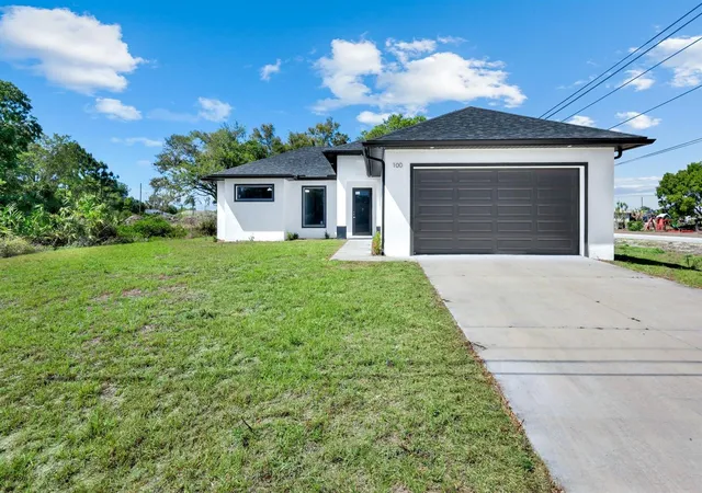 2nd image of 100 Parish Dr, Lehigh Acres, FL 33974 | MLS# TB8524942