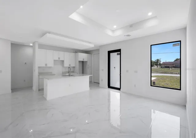 5th image of 100 Parish Dr, Lehigh Acres, FL 33974 | MLS# TB8524942