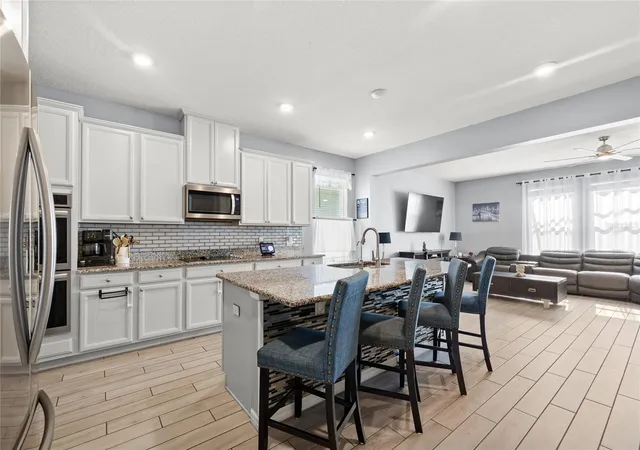 Photo 2 of Single family home for sale at 12015 Stone Bark Trl, Orlando, FL 32824 | MLS# O6421438 | Listing updated on 2026-08-05