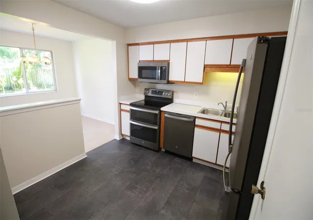 Homes for sale in Orlando, FL | 5301 White Cliff Ln #2, Orlando, FL 32812 | MLS# O6421450