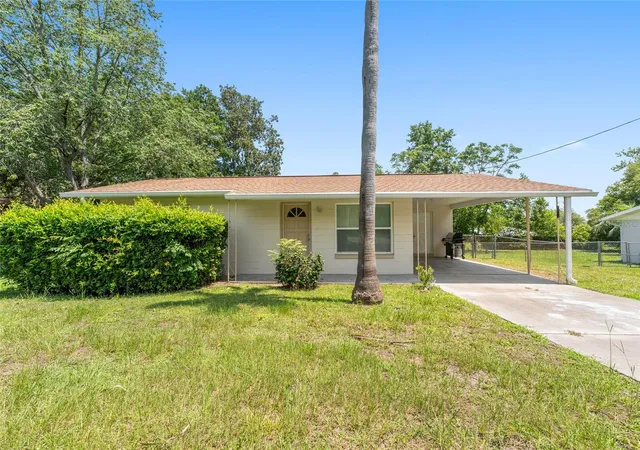 1st image of 21545 Sw Honeysuckle St, Dunnellon, FL 34431 | MLS# OM727739