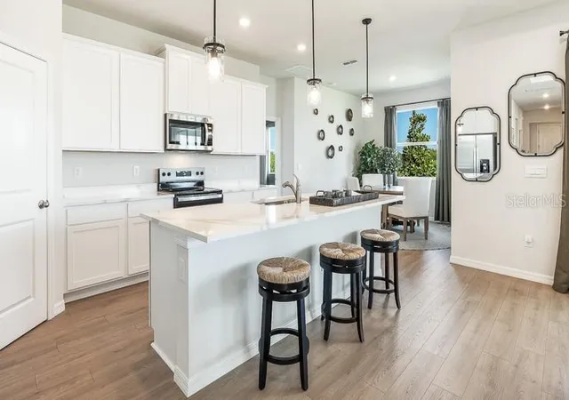 Photo 2 of Single family home for sale at 10433 Woodland Garden Way, Parrish, FL 34219 | MLS# A4698711 | Listing updated on 2026-10-28