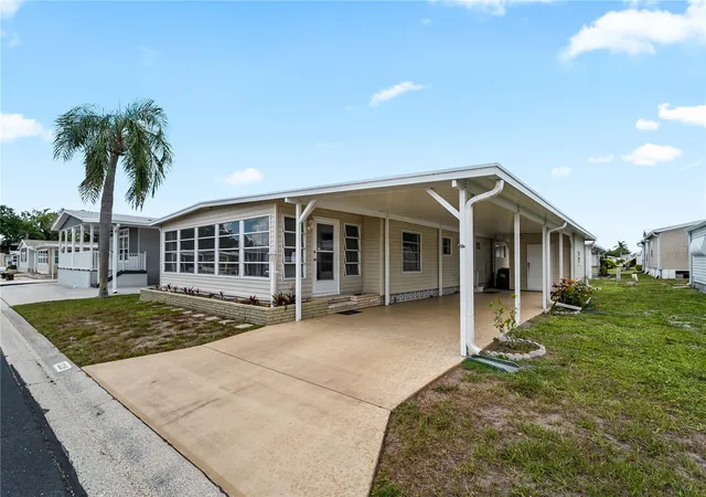 Photo 1 of Manufactured home for sale at 3226 Sweet Bay Ter, Sarasota, FL 34237 | MLS# A4698716 | Listing updated on 2026-08-25