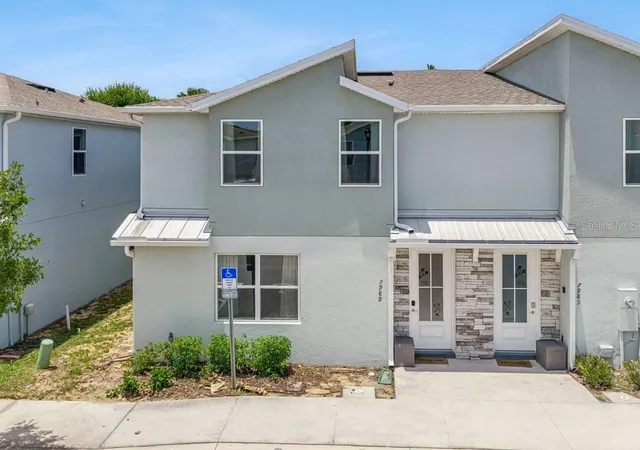 Photo 1 of Townhouse for sale at 7989 Formosa Valley Pl, Kissimmee, FL 34747 | MLS# O6421562 | Listing updated on 2026-07-18