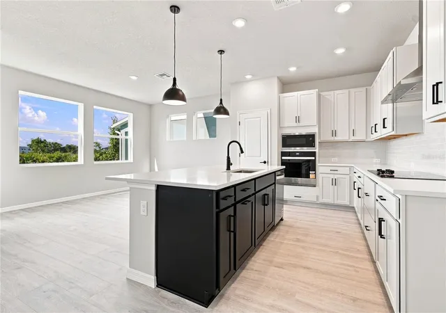 Photo 3 of Single family home for sale at 3395 Yellow Cassia Dr, Zephyrhills, FL 33543 | MLS# TB8525128 | Listing updated on 2026-10-07
