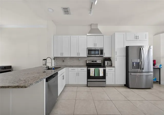 Photo 4 of Single family home for sale at 14435 Windchime Ln, Orlando, FL 32837 | MLS# S5152868 | Listing updated on 2026-08-28