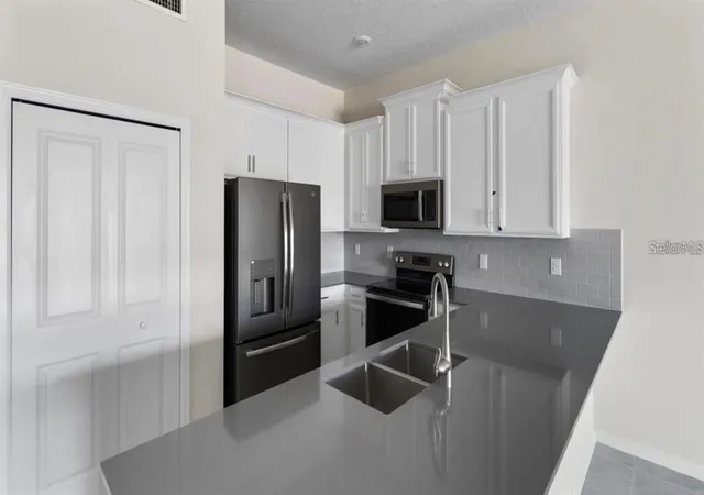4th image of 857 Ocean Course Ave #857, Davenport, FL 33896 | MLS# O6421683