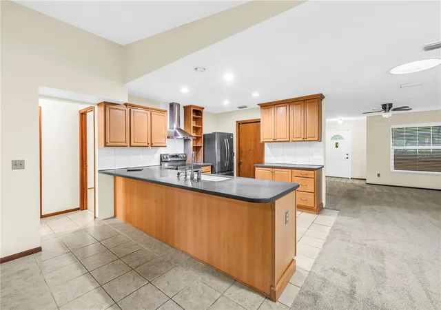 4th image of 12220 Wild Acres Rd, Largo, FL 33773 | MLS# TB8525298