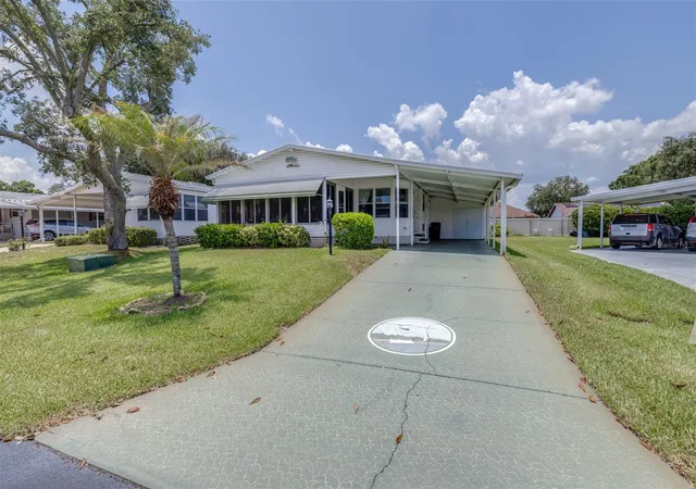Photo 2 of Manufactured home for sale at 6235 Knotty Pine Dr Se, Winter Haven, FL 33884 | MLS# P4939218 | Listing updated on 2026-08-21