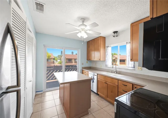 Listing Photo 4 - Condo for sale in building located at 3820 Lighthouse Wy, NEW PORT RICHEY, FL 34652