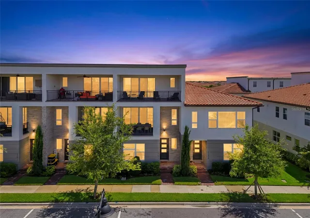 Photo 1 of Townhouse for sale at 13623 Larkton Ln, Orlando, FL 32832 | MLS# O6421806 | Listing updated on 2026-07-03