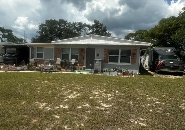 Photo 1 of Single family home for sale at 1721 N Hudson St, Orlando, FL 32808 | MLS# O6421883 | Listing updated on 2026-07-18