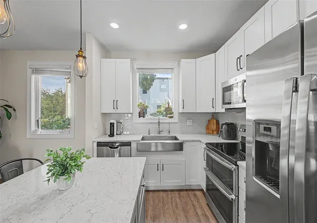 Photo 4 of Townhouse for sale at 1527 N Morgan St, Tampa, FL 33602 | MLS# TB8525433 | Listing updated on 2026-08-13