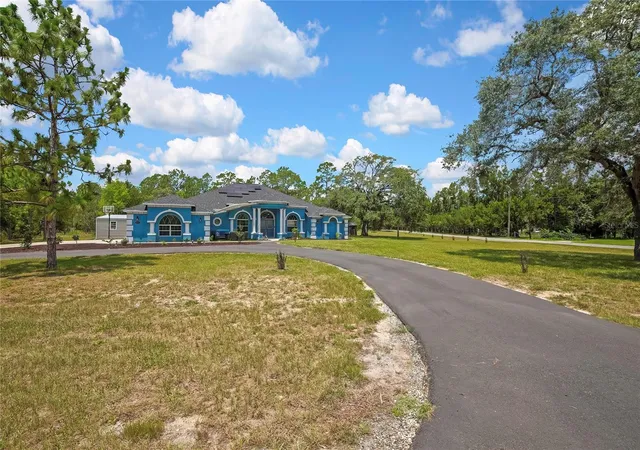 4th image of 4016 Jacaranda Cir, Brooksville, FL 34604 | MLS# W7887309