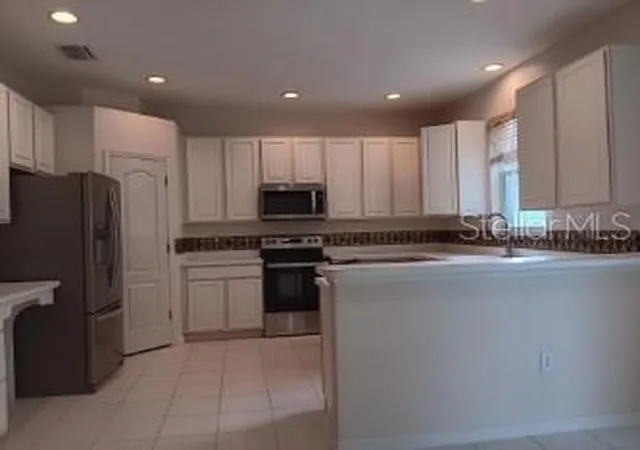 5th image of 10415 Lucaya Dr, Tampa, FL 33647 | MLS# O6421975