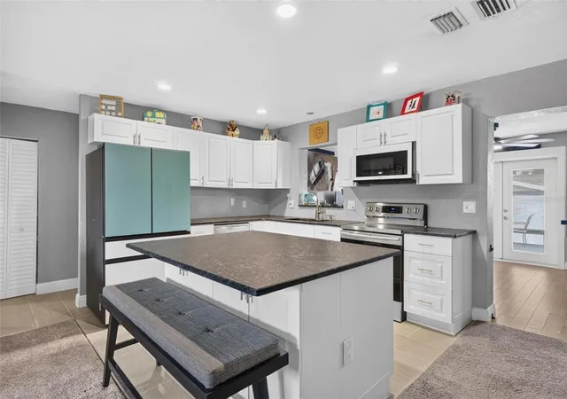 3rd image of 3113 Palm Ct, Dunedin, FL 34698 | MLS# TB8525537
