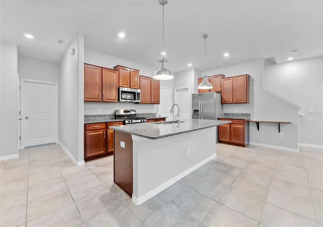 Photo 3 of Townhouse for sale at 16912 Red Brick Ln, Land O Lakes, FL 34638 | MLS# TB8525623 | Listing updated on 2026-09-24