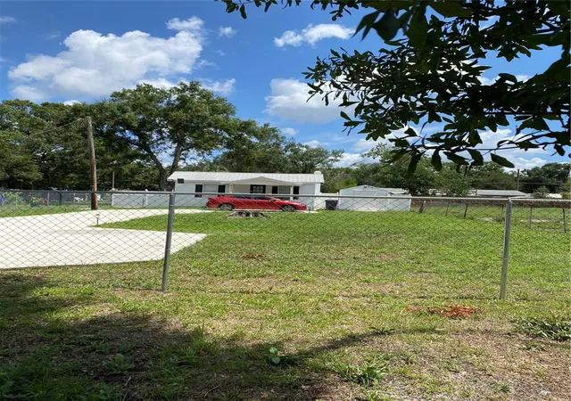 Photo 2 of Single family home for sale at 1835 W Greenwood St, Lakeland, FL 33815 | MLS# TB8525680 | Listing updated on 2026-07-04