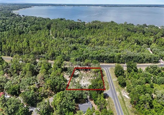 1st image of 3 Bay Dr, Ocklawaha, FL 32179 | MLS# O6422128