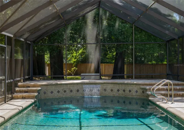Photo 2 of Single family home for sale at 2009 Woody Dr, Windermere, FL 34786 | MLS# O6422132 | Listing updated on 2026-10-24