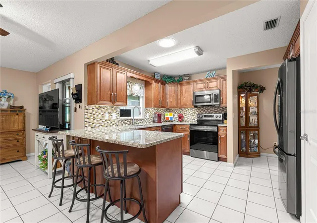 Photo 3 of Single family home for sale at 9256 Sw 82nd Terrace #E, Ocala, FL 34481 | MLS# OM727883 | Listing updated on 2026-08-30