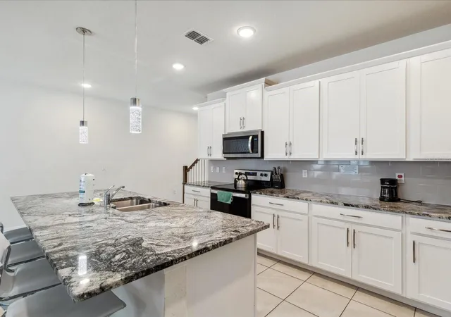 Photo 3 of Townhouse for sale at 1632 Tropical Palms Cir, Kissimmee, FL 34747 | MLS# O6422192 | Listing updated on 2026-07-04