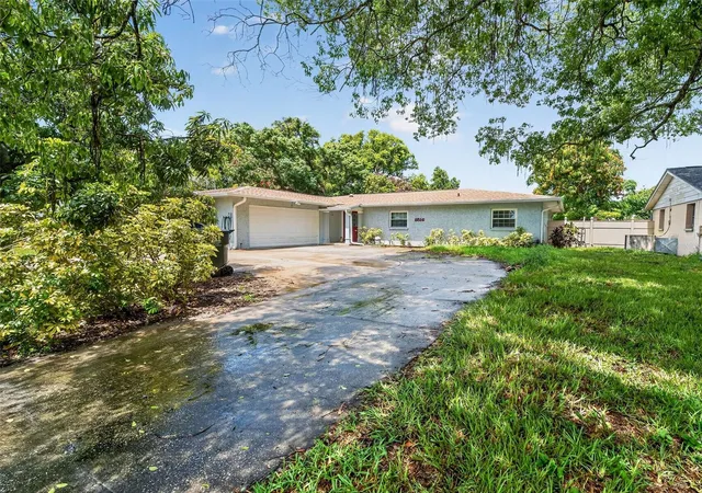 Photo 2 of Single family home for sale at 8516 Twin Lake Blvd, Tampa, FL 33614 | MLS# TB8525828 | Listing updated on 2026-08-22