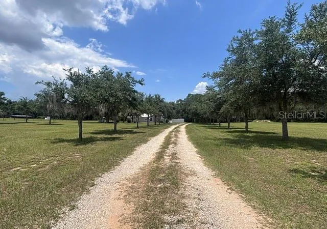 Photo 3 of Single family home for sale at 12601 Double Run Rd, Astatula, FL 34705 | MLS# G5114632 | Listing updated on 2026-08-27