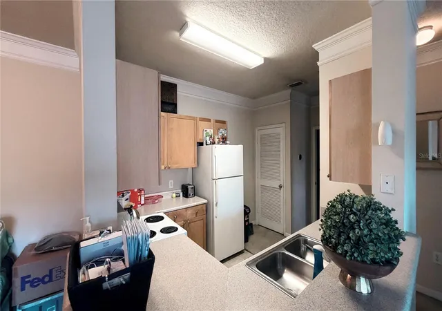 Listing Photo 5 - Condo for sale in building located at 8849 Villa Vw Cir, Orlando, FL 32821 - Unit #302