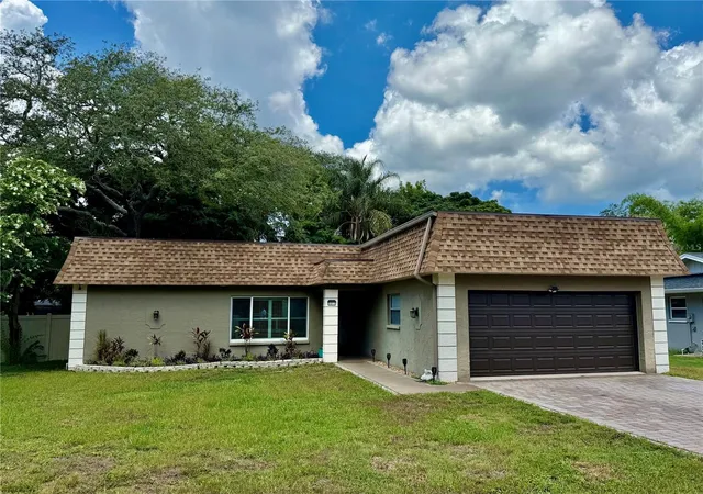 1st image of 1011 Winding Oaks Dr, Palm Harbor, FL 34683 | MLS# TB8525903