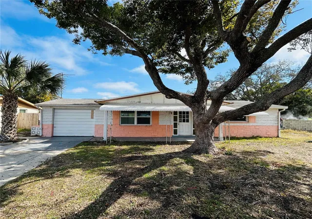 1st image of 2412 Arcadia Rd, Holiday, FL 34690 | MLS# TB8525985