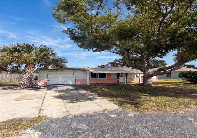 Photo 1 of Single family home for sale at 2412 Arcadia Rd, Holiday, FL 34690 | MLS# TB8525985 | Listing updated on 2026-10-08