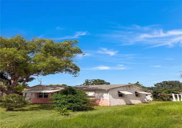 Photo 3 of Single family home for sale at 2412 Arcadia Rd, Holiday, FL 34690 | MLS# TB8525985 | Listing updated on 2026-10-08