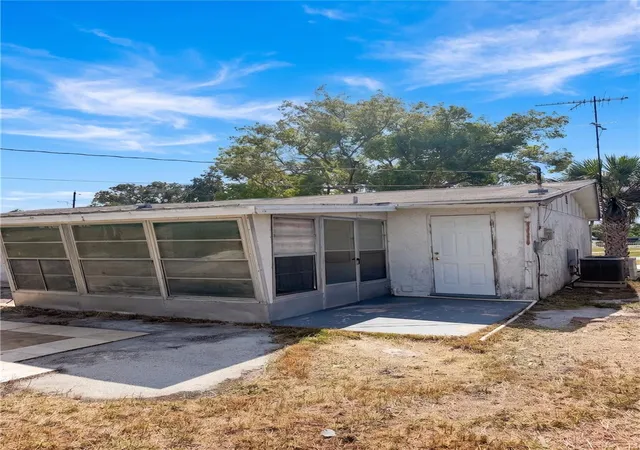 Photo 3 of Single family home for sale at 2412 Arcadia Rd, Holiday, FL 34690 | MLS# TB8525985 | Listing updated on 2026-10-08