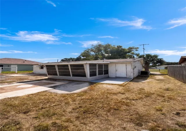 Photo 4 of Single family home for sale at 2412 Arcadia Rd, Holiday, FL 34690 | MLS# TB8525985 | Listing updated on 2026-10-08