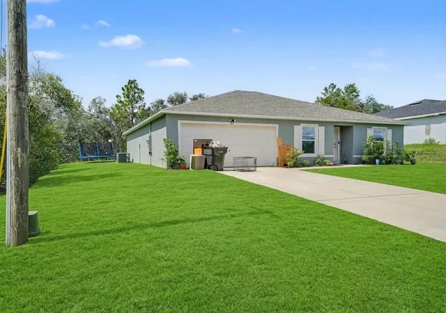 Photo 2 of Single family home for sale at 305 Bowfin Dr, Kissimmee, FL 34759 | MLS# TB8525992 | Listing updated on 2026-08-28