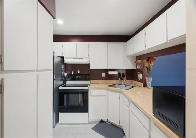 4th image of 1182 Pine Ridge Cir W #A3, Tarpon Springs, FL 34688 | MLS# TB8526008