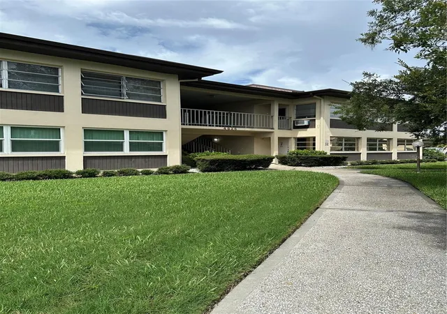 Photo 1 of Condo for sale at 4826 Marine Pkwy #202, New Port Richey, FL 34652 | MLS# W7887345 | Listing updated on 2026-07-15
