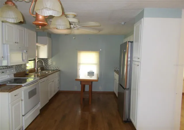 Photo 3 of Manufactured home for sale at 6872 Haawi Ct, North Port, FL 34287 | MLS# C7528069 | Listing updated on 2026-07-11
