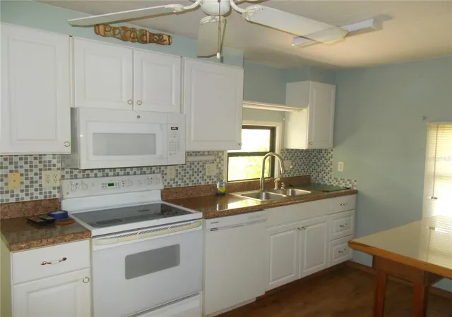 Photo 4 of Manufactured home for sale at 6872 Haawi Ct, North Port, FL 34287 | MLS# C7528069 | Listing updated on 2026-07-11