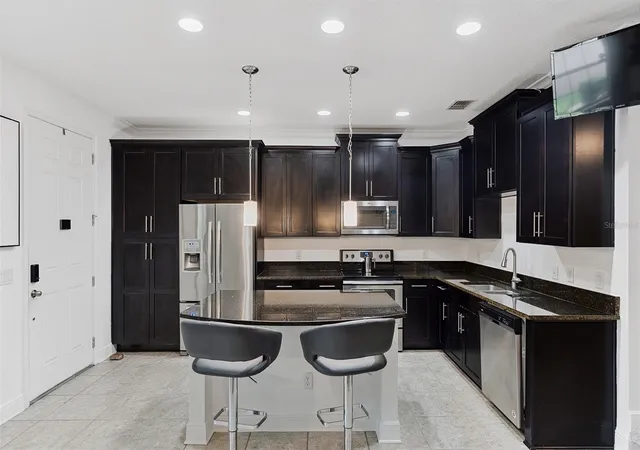 Photo 3 of Townhouse for sale at 9956 Eagle Crk Ctr Blvd, Orlando, FL 32832 | MLS# S5153106 | Listing updated on 2026-08-11
