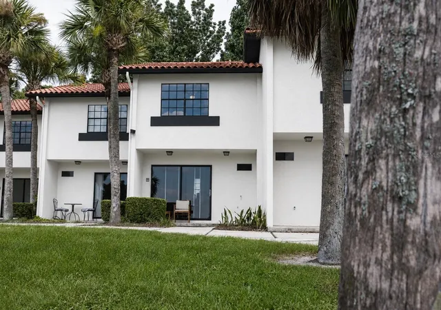 Listing Photo 1 - Condo for sale in building located at 10330 Turkey Lake Rd, ORLANDO, FL 32819 - Unit #109