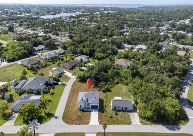 Photo 3 of Sale Pending at 543 Chamber St Nw, Port Charlotte, FL 33948 | MLS# O6422629 | Listing updated on 2026-10-23