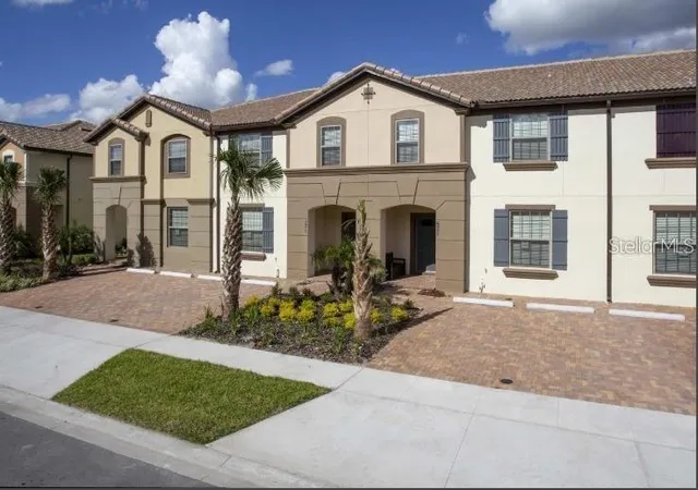Photo 1 of Townhouse for sale at 8875 Geneve Ct, Kissimmee, FL 34747 | MLS# O6422639 | Listing updated on 2026-07-07