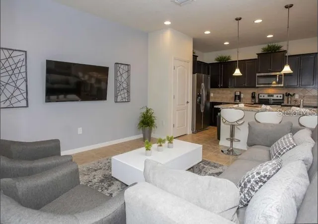 Photo 3 of Townhouse for sale at 8875 Geneve Ct, Kissimmee, FL 34747 | MLS# O6422639 | Listing updated on 2026-07-07