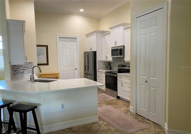 5th image of 58 Tee View Rd, Rotonda West, FL 33947 | MLS# O6422648
