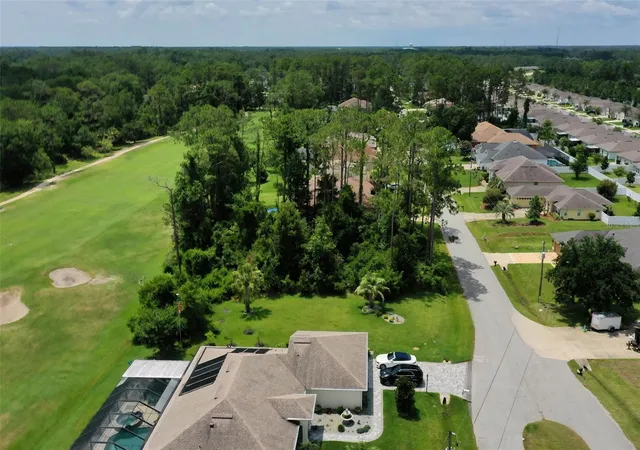 Photo 2 of Land for sale at 93 Edward Dr, Palm Coast, FL 32164 | MLS# FC319758 | Listing updated on 2026-07-07