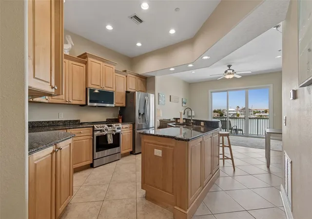 Photo 4 of Townhouse for sale at 620 Bayway Blvd #5, Clearwater Beach, FL 33767 | MLS# TB8526348 | Listing updated on 2026-09-16