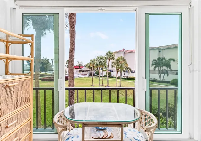 Listing Photo 2 - Condo for sale in building located at 7400 Sun Island Dr S, South Pasadena, FL 33707 - Unit #203